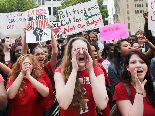 061513_school-layoffs-protest