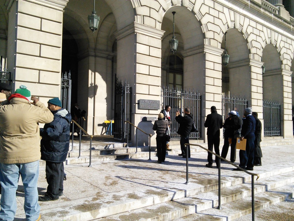 Supporters outside the courthouse after the hearing