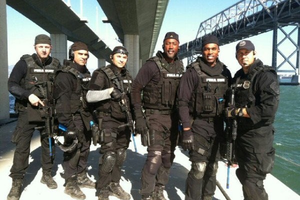 Urban Shield is an annual police conference touting the newest weapons of war available to cops, including unmanned flying aircraft (or drones), combat knives, mechanized armored vehicles and sniper rifles. It’s also a highly controversial, ill-timed conference coming right after 2014′s summer riots in Ferguson, Mo., during which police militarization became an issue in the American conscience. The conference’s host city, Oakland, Cali., has said it doesn’t want them back again. This didn’t stop the Philadelphia Police Department from sending a delegation and enjoying the conference’s tactical training exercises, which occurred simultaneous to the gun show. Nor did it stop the PPD’s Joe Sullivan, who specializes in military-style response units like counterterrorism and SWAT, from tweeting about Philly’s participation in the event.