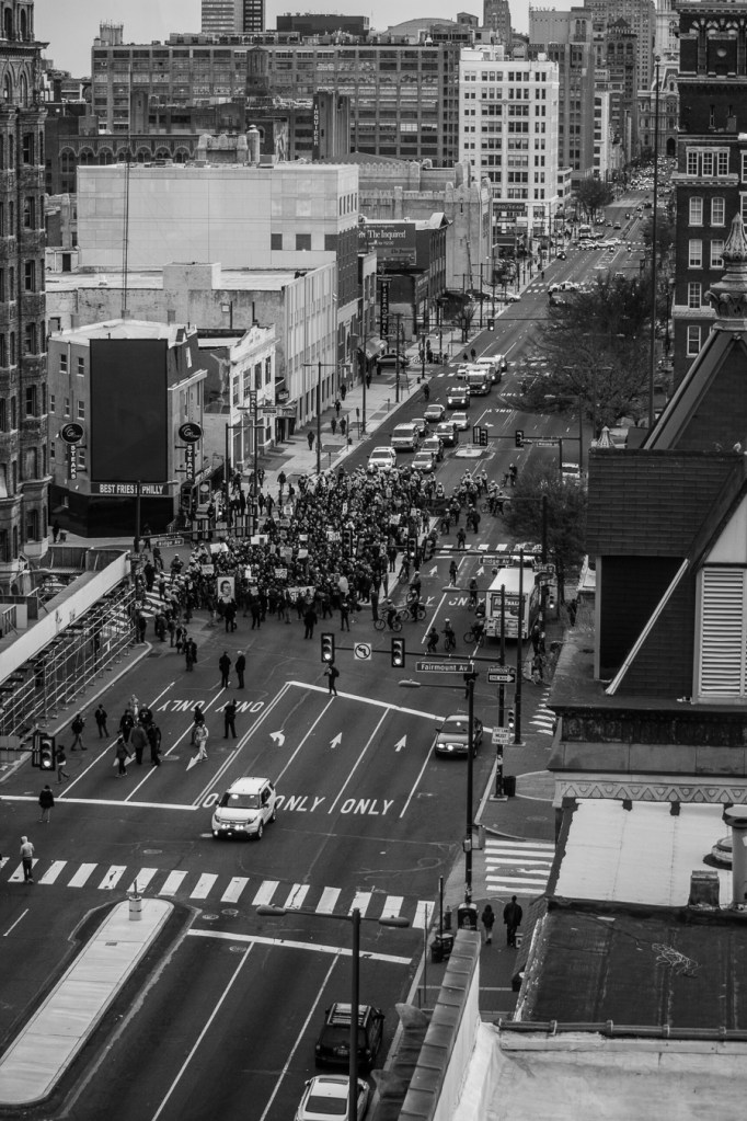 Protesters marched past the Divine Lorraine in North Philadelphia Tuesday. 