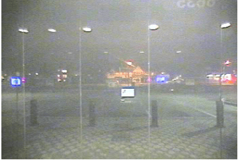 ATM video six seconds later, 2:39:34 am. Dome lights are visible behind Tate-Brown's car, and his lights are visibly dimmer.