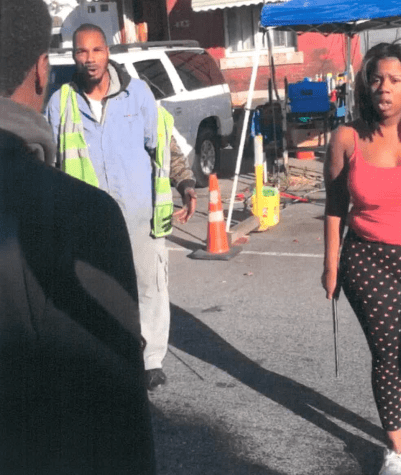 Still from video showing Michael Douglas facing Darnell Wright and Christina Johnson. A baton is visible in Johnson's hand. Exhibit D for Motion to Appoint Fifth Amendment Counsel, Com. v. Douglas, CP-51-CR-0001101-2016 (Phila. C.P. Apr. 28, 2016).